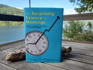 Photo of the book The Surprising Science of Meetings by Steven G. Rogelberg. Photography by Sharon K. Summerfield at Horne Lake, BC