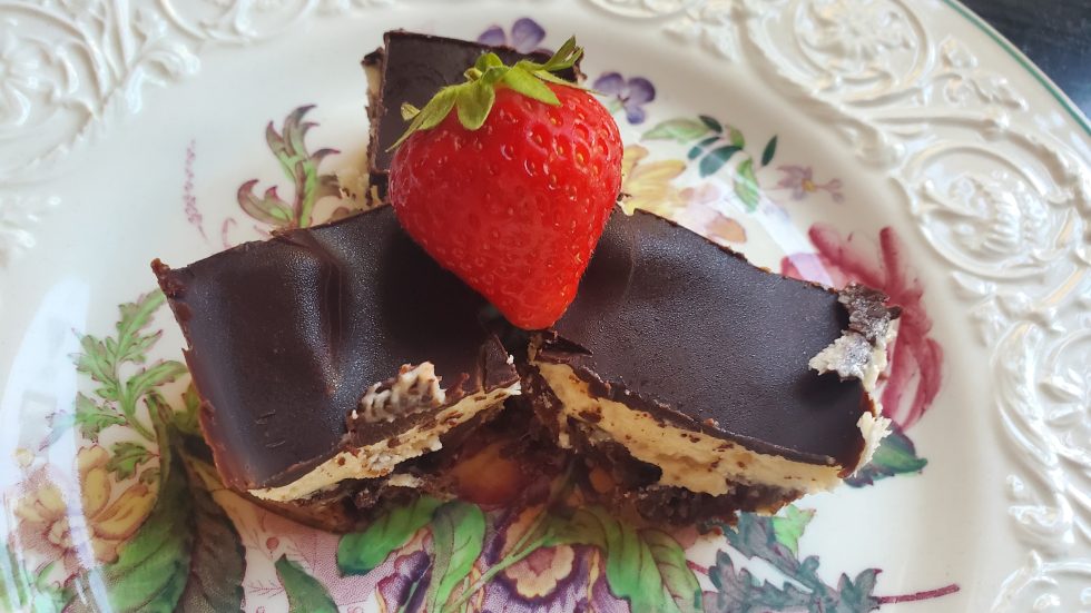 Nanaimo Bars with a Strawberry